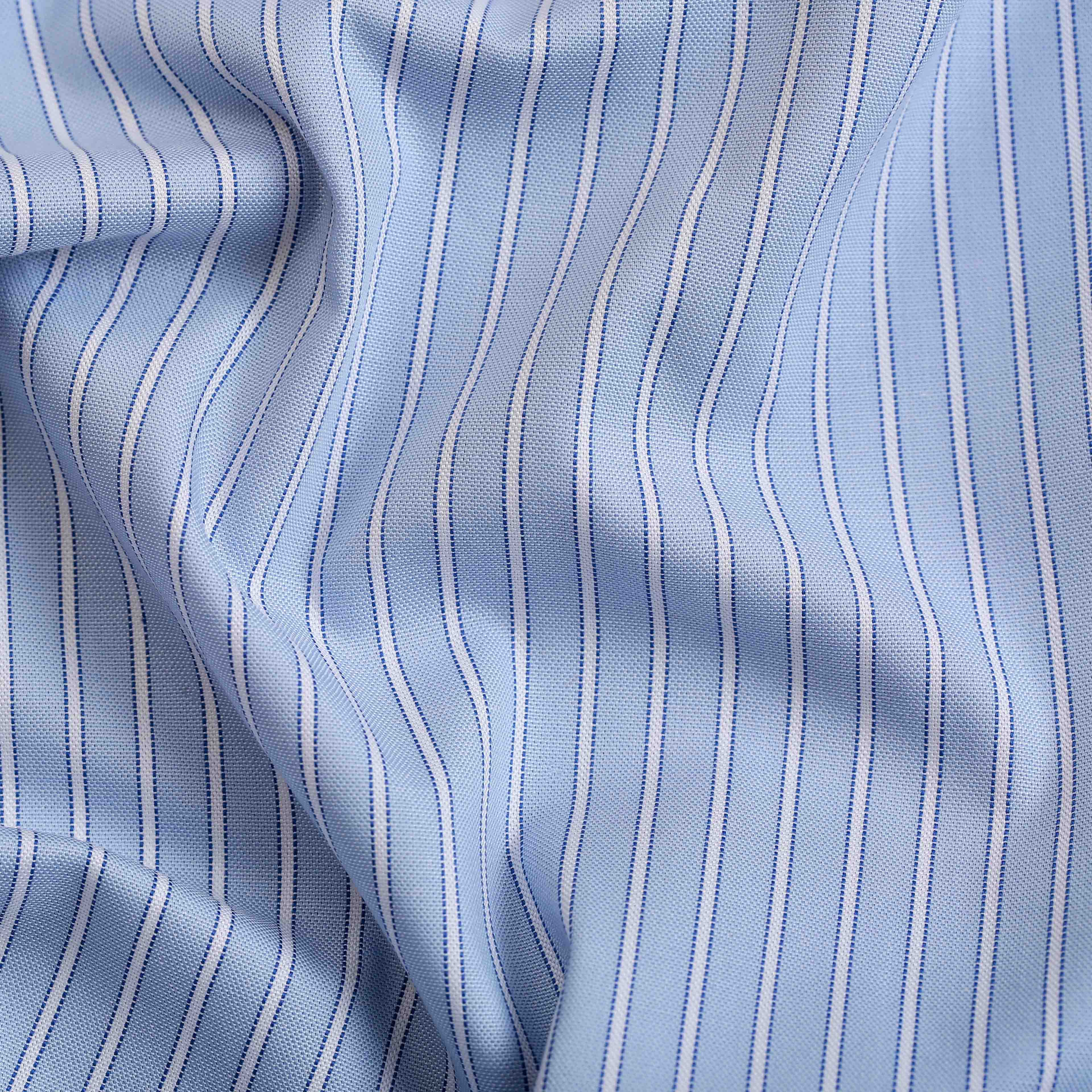 Light blue striped fabric with soft folds